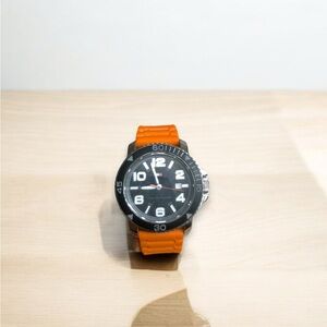 ✨MENS BLACK AND ORANGE WATCH✨